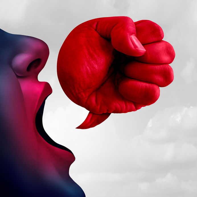 Image of a fist coming out of a person’s mouth