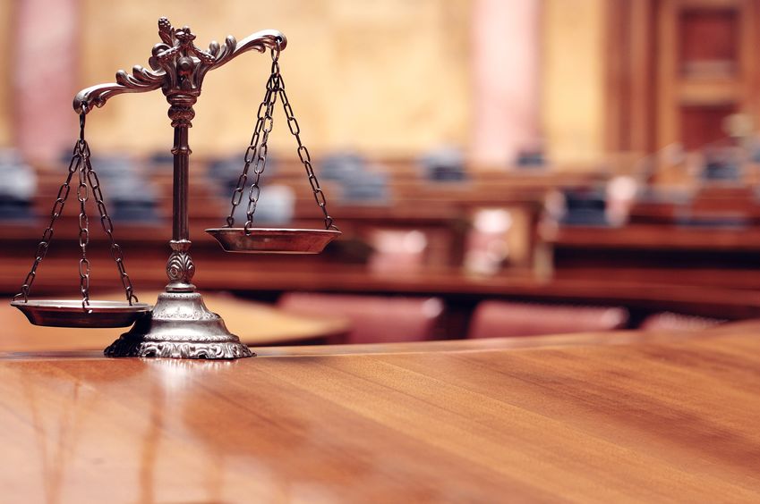 Photo of a balance scale, a symbol of justice. Photo of a balance scale, a symbol of justice.