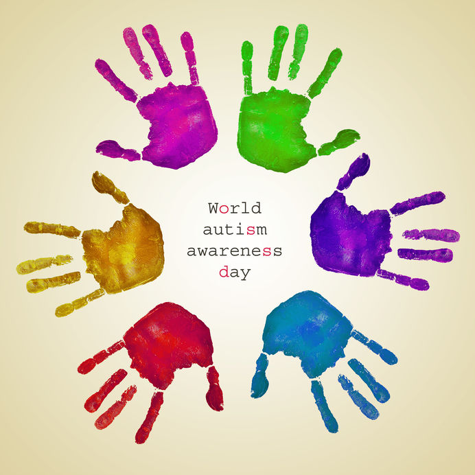Coloured hand prints forming a circle