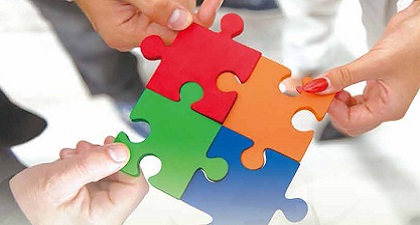 Four pieces of puzzles in different colours are put together