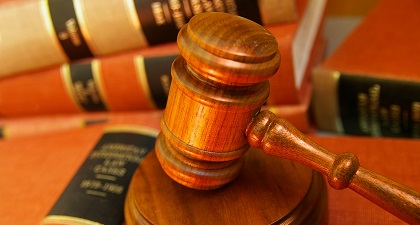 A photo showing some books and a gavel