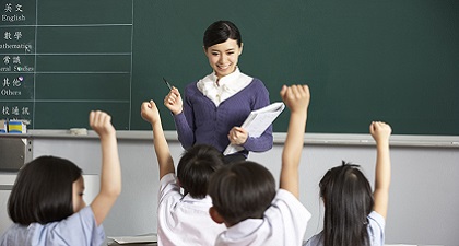 A teacher and students in a classroom