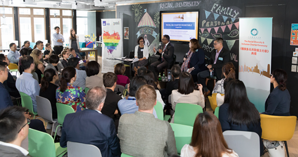 Mr. Sudesh Thevasenabathy, AXA HK; Esther Blythe, British Consulate-General, HK and Henry Ling, Dow Chemical speaking to Niru Vishwanath of EOC during the